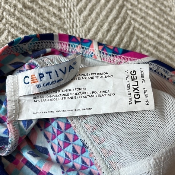 Geometric Patterned Tankini Top with Solid Navy Bottoms - Picture 6 of 15